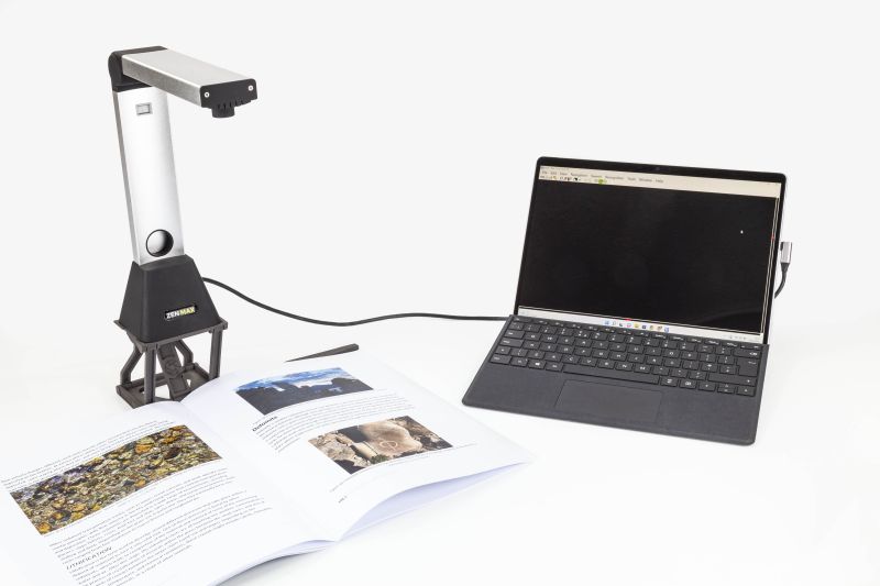 ZEN MAX attached to a laptop capuring a large magazine_web