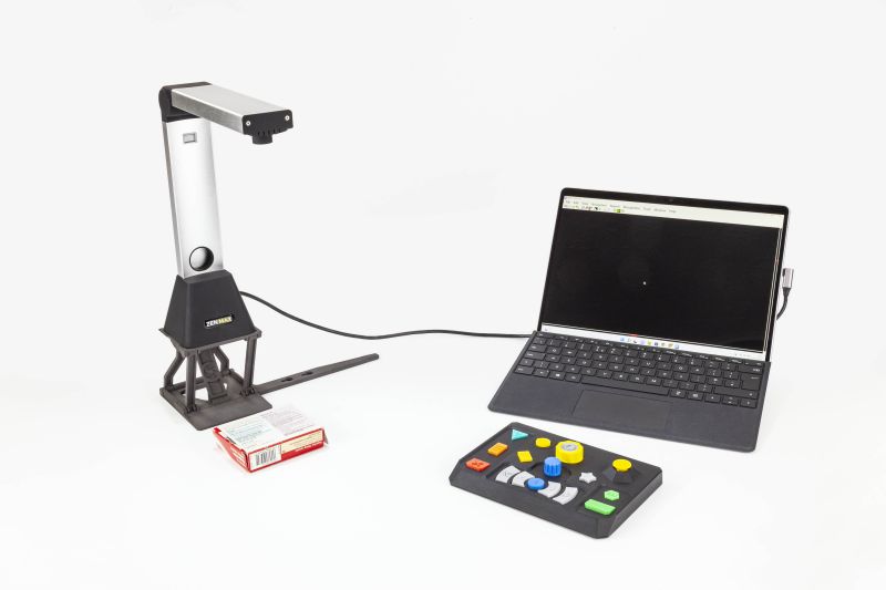 ZEN MAX attached to a laptop capturing a medicine package with keypad in front of the laptop_web